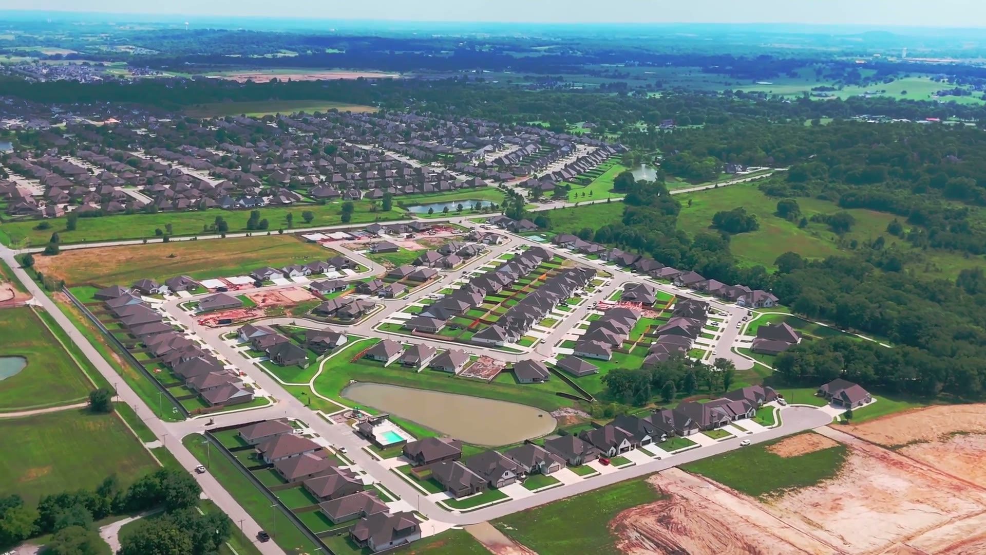 Aerial view of a property and its lot