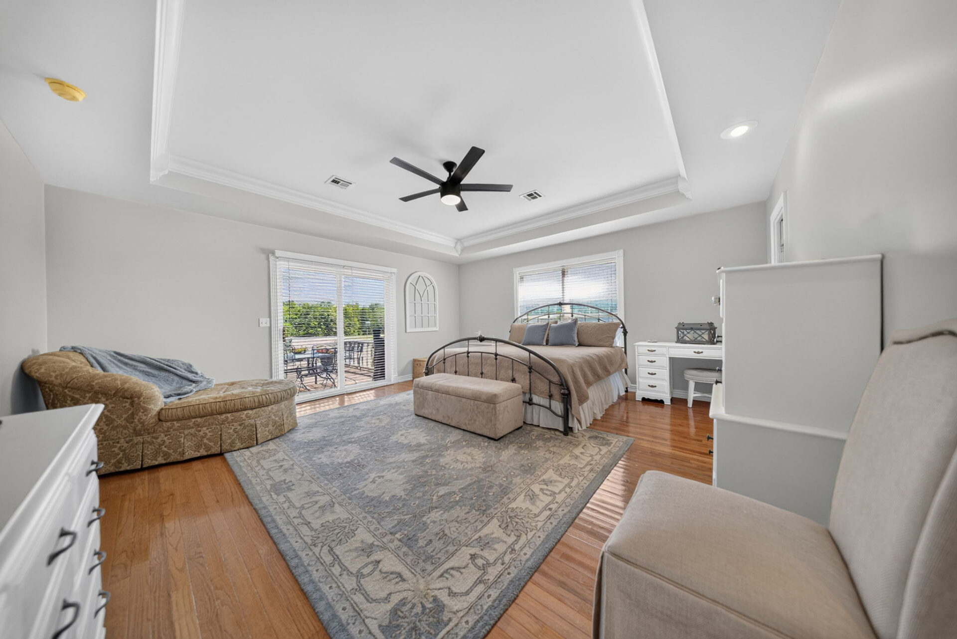 Primary bedroom suite photographed for a Tulsa area real estate listing